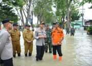 Kapolres Gresik Salurkan Bantuan Sosial Bagi Warga Terdampak Banjir di Benjeng