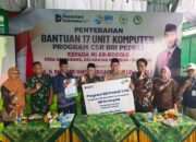 BRI Kanca Krian Salurkan Bantuan Komputer Kepada MI Ar-Rosyad Prambon